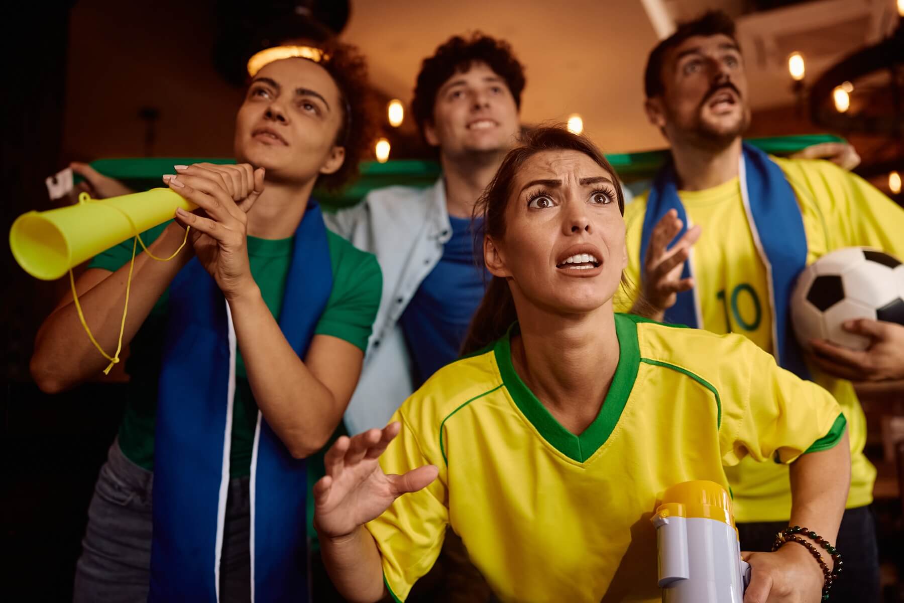 Sports fan watching a live game on a sports streaming app
